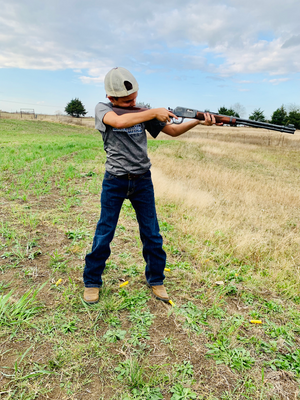 The Boss, Joaquin, practicing with his lever action 22 cal. rifle.