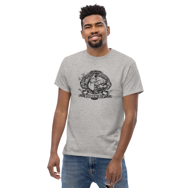 Field Dress fly fishing mens t-shirt shows a trout about to take the fly from a distant fly fisherman, the phrase "hook-up", and the established date of fishing 2000BC.