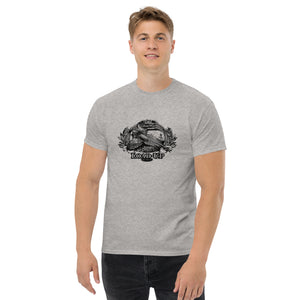 Field Dress pheasant hunting mens t-shirt shows a flushed pheasant and a distant hunter taking aim, the phrase "load-up", and the established date of firearms 1515AD.
