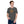 Load image into Gallery viewer, Field Dress Evolution of Archery t-shirt showing a archer from the Asian empire, a native American indian, and the present day on the sun's horizon.