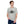 Load image into Gallery viewer, Field Dress rifle hunting tee shows a whitetail buck and a distant hunter taking aim, the phrase "load-up", and the established date of firearms 1515AD.