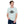 Load image into Gallery viewer, Field Dress rifle hunting tee shows a whitetail buck and a distant hunter taking aim, the phrase "load-up", and the established date of firearms 1515AD.