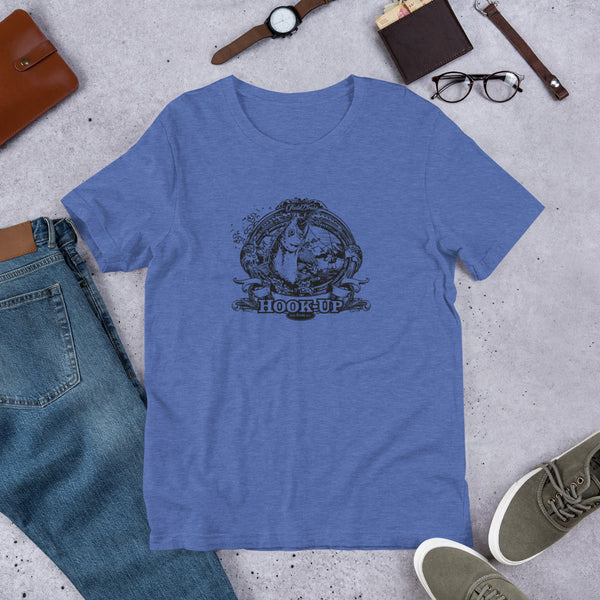 Field Dress fly fishing t-shirt shows a trout about to take the fly from a distant fly fisherman, the phrase "hook-up", and the established date of fishing 2000BC.