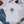 Load image into Gallery viewer, Field Dress Evolution of Fishing t-shirt showing a fisherman from the Asian empire, a native American indian, and the present day on the sun's horizon.