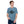 Load image into Gallery viewer, Field Dress pheasant hunting t-shirt shows a flushed pheasant and a distant hunter taking aim, the phrase "load-up", and the established date of firearms 1515AD.