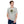 Load image into Gallery viewer, Field Dress Evolution of Firearms t-shirt showing a sportsman from the Asian empire, a frontiersman, and the present day on the sun&#39;s horizon.
